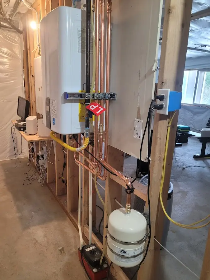 Licensed plumber repairing a kitchen sink in Bushkill